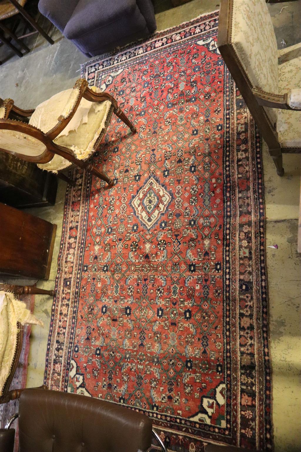 A North West Persian red ground rug, 280 x 140cm, together with a runner